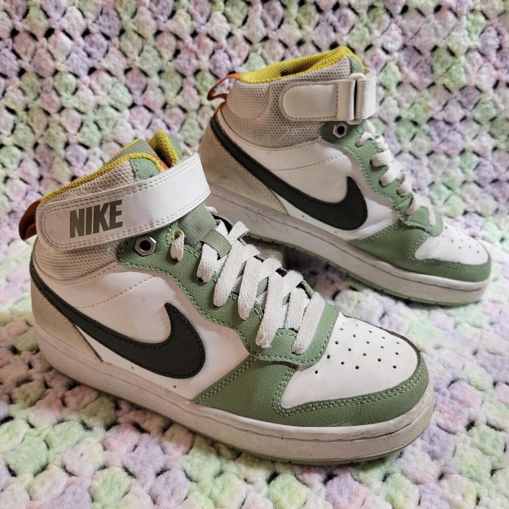 Nike Court Borough Mid sneakers in white, green, and black with a black Nike swo